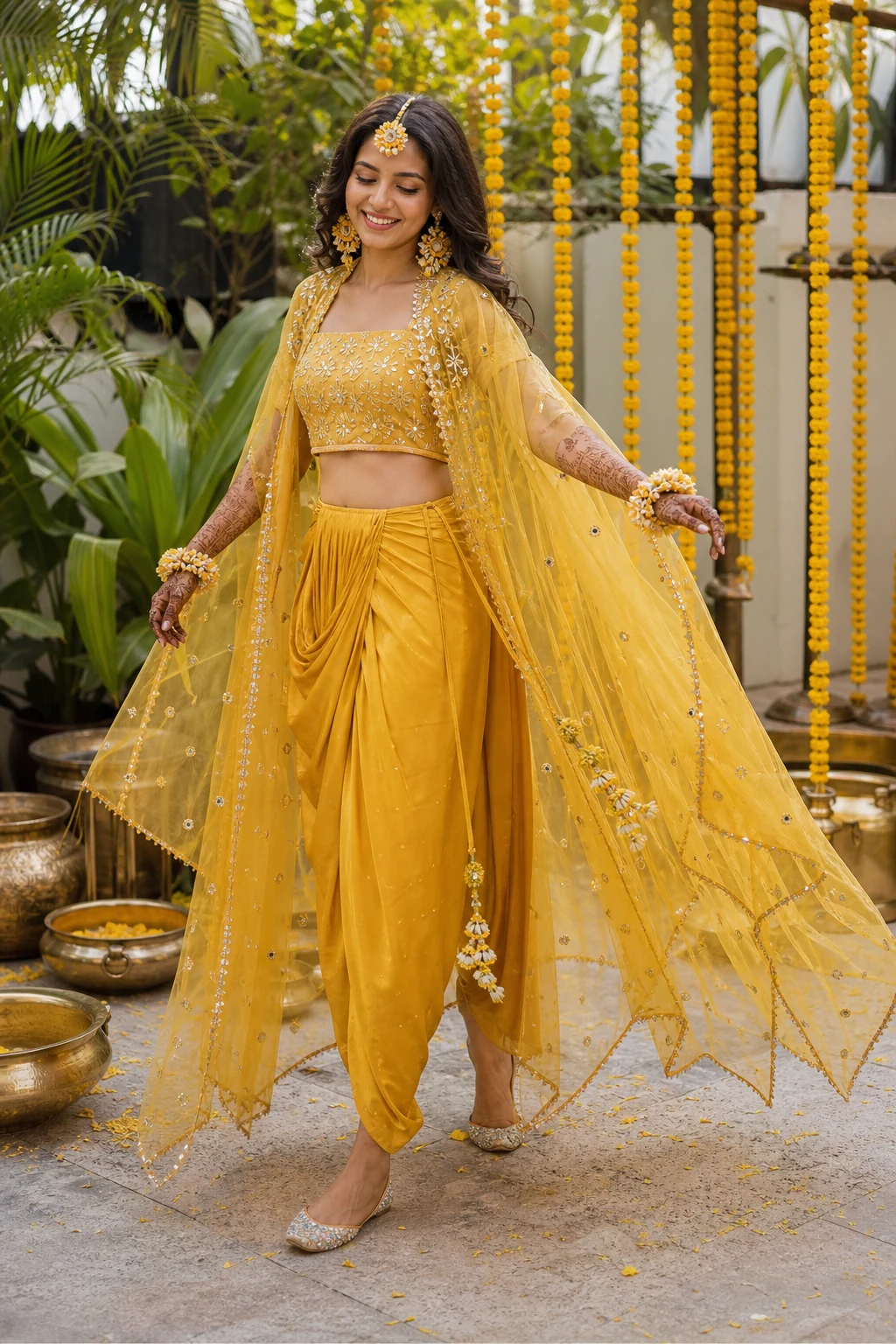Indian bride in mustard dhoti pants and sheer cape for haldi